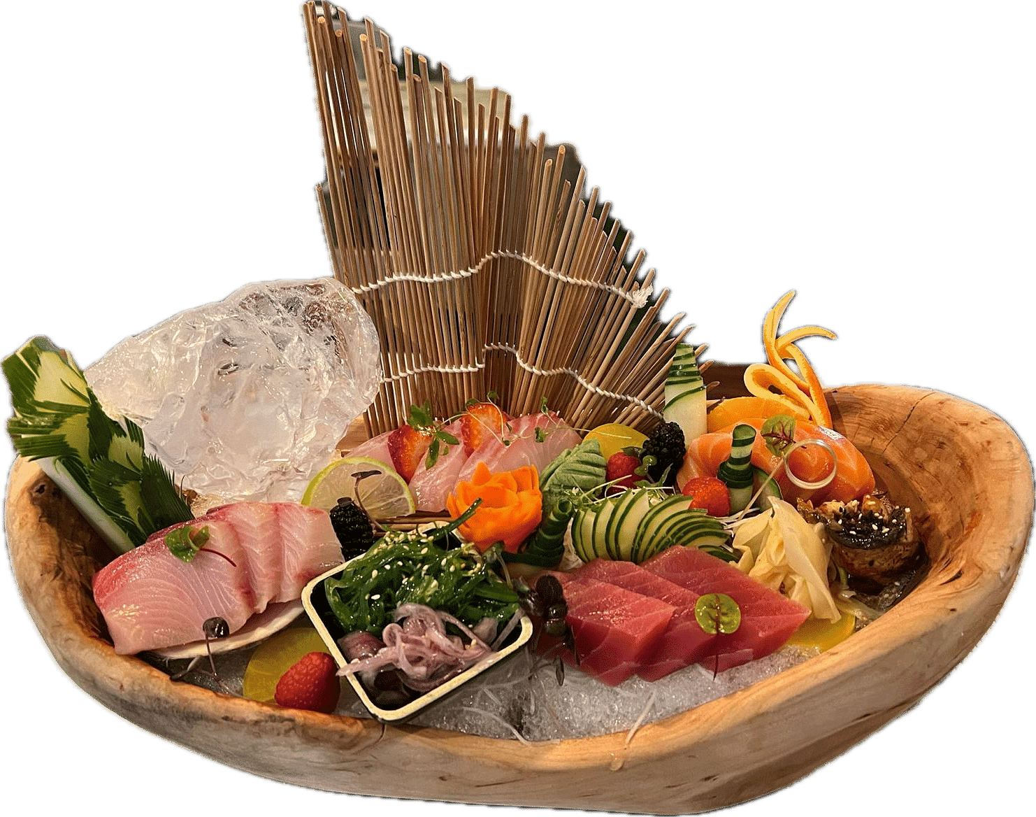 Assorted sashimi platter with various fresh fish, garnishes, and a decorative wooden display.